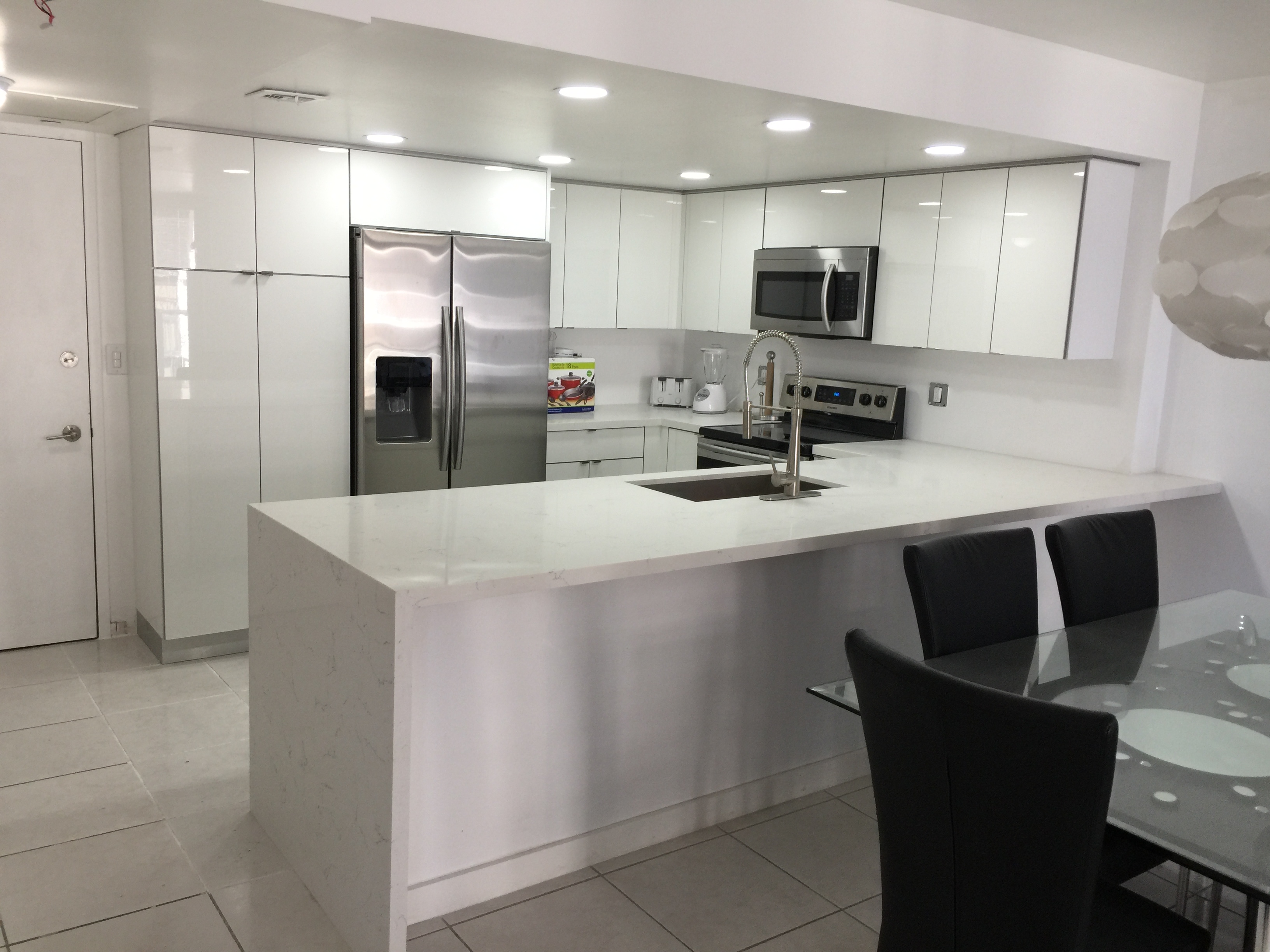 Modern White Kitchen Cabinet Installation
